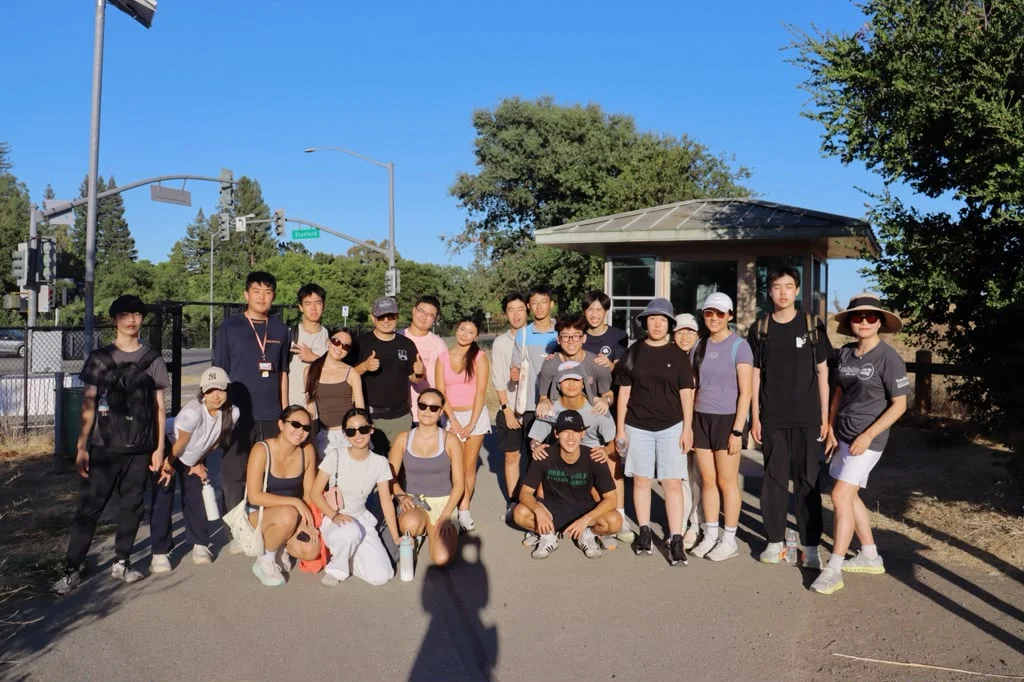 Students and mentors gathered together during an outdoor outing